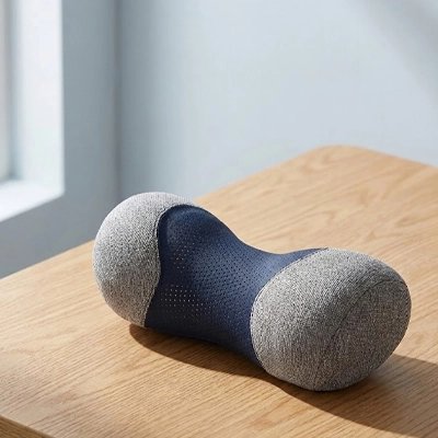 Oreiller cervical ergonomique en forme de rouleau conçu pour soutenir la nuque et favoriser la détente
