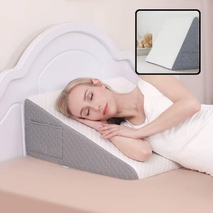 Oreiller ergonomique avec support intégré pour tablette ou téléphone lors de la détente au lit